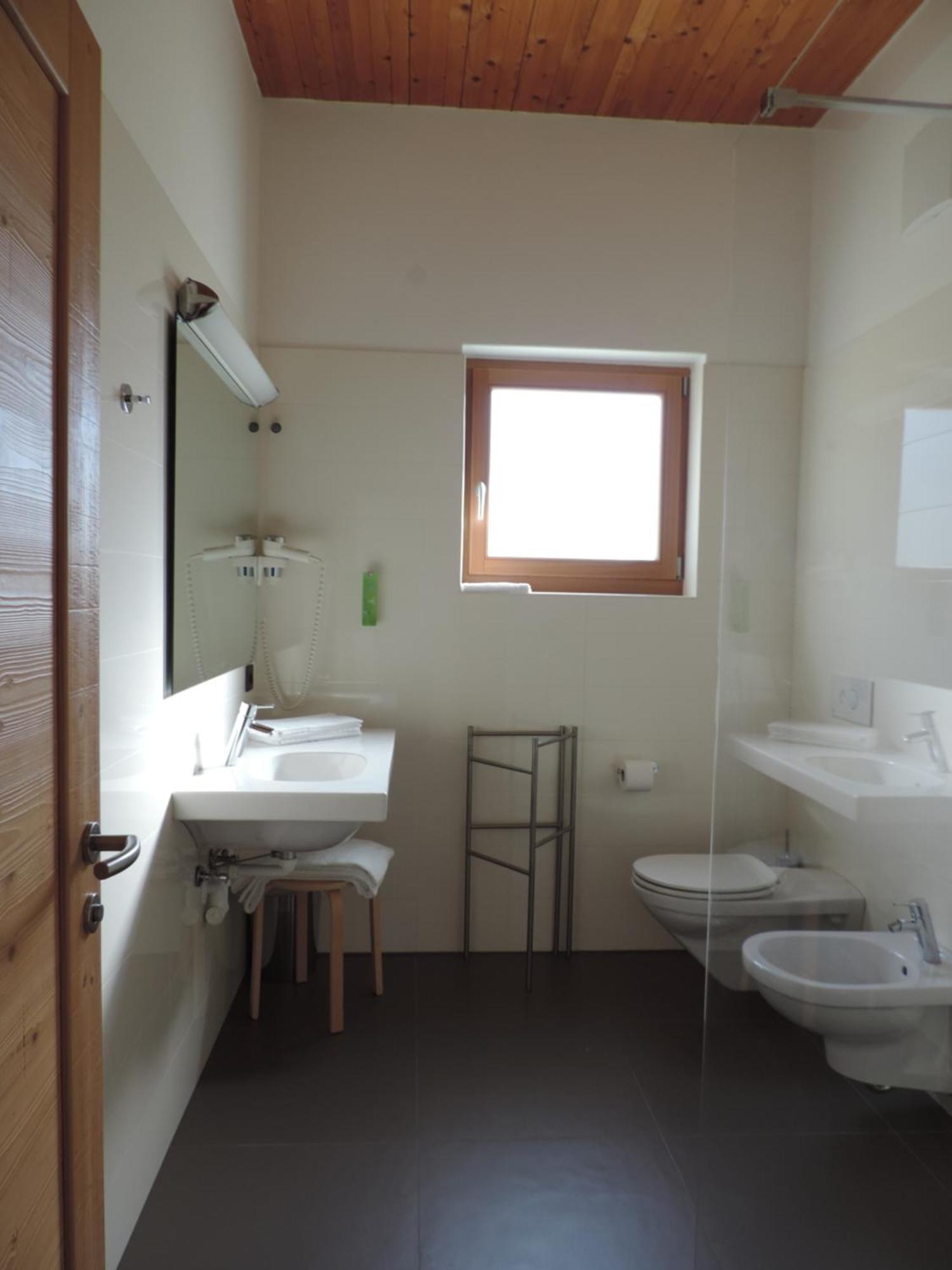 Garni Tuttotondo Hotell Levico Terme Rom bilde